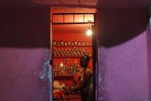 Gender & Energy Projects: Woman in a lighted shop