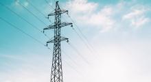 Energy Law and Regulation- A close up of a electric tower