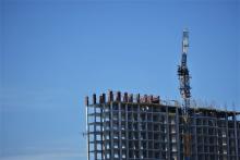 Marketing the PPP, Crane on top of a building construction, structure