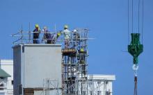 Dedicated PPP Units, construction worker on top of a structure at work