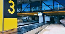 Innovative Revenues for Infrastructure, Modern yellow building, airport terminal, baggage areal
