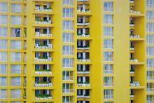 CVC in Affordable Housing, Free photo yellow window pattern at apartment building