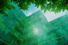 Photo ecofriendly building in modern city sustainable glass office building with tree