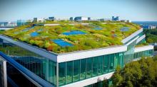 Rooftop Solar Installation Model for ERP, view of a green roof on a modern building with solar panels