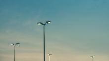 LED Streetlight Deployment Model for ERP - for Efficient Outdoor and Street Lighting Technologies, street lamps isolated with blue sky background